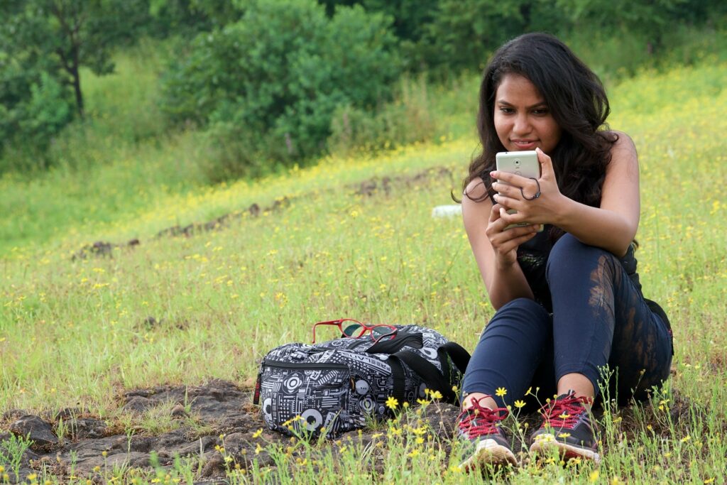 A woman using a mobile phone to access legal guidance